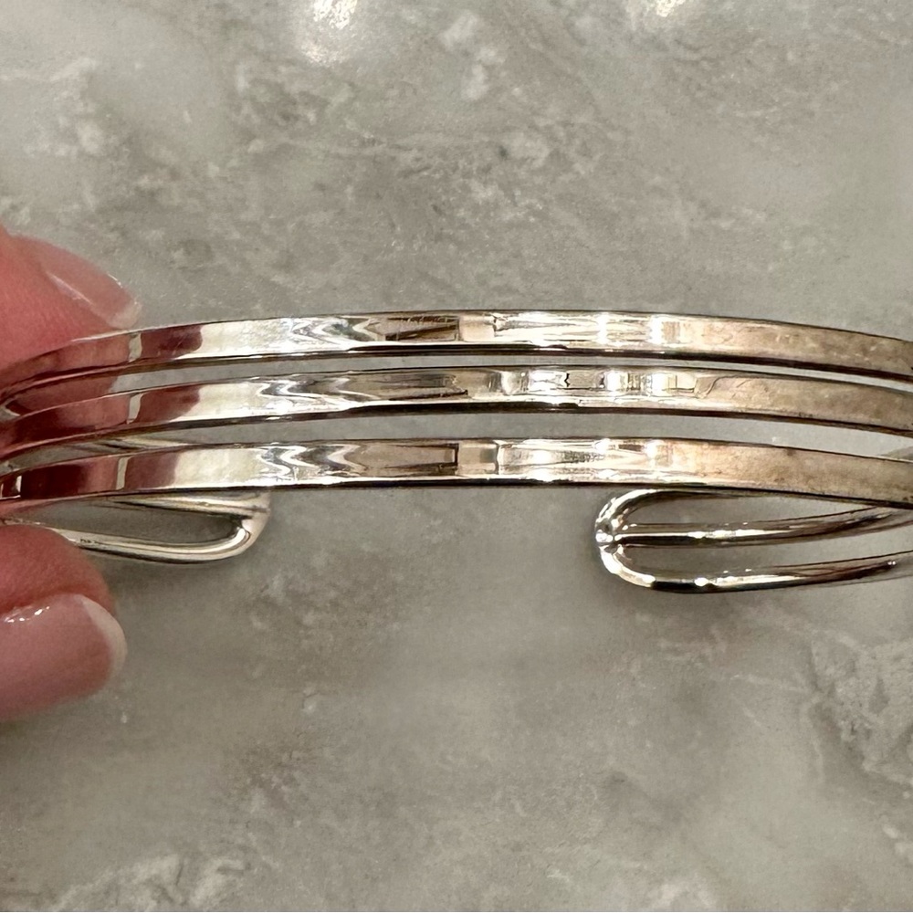Two silver bracelets- like new!